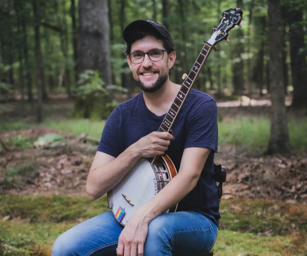 Meet the Grammy-Nominated NC Musician Who Played For Protesters at Louis DeJoy’s Home