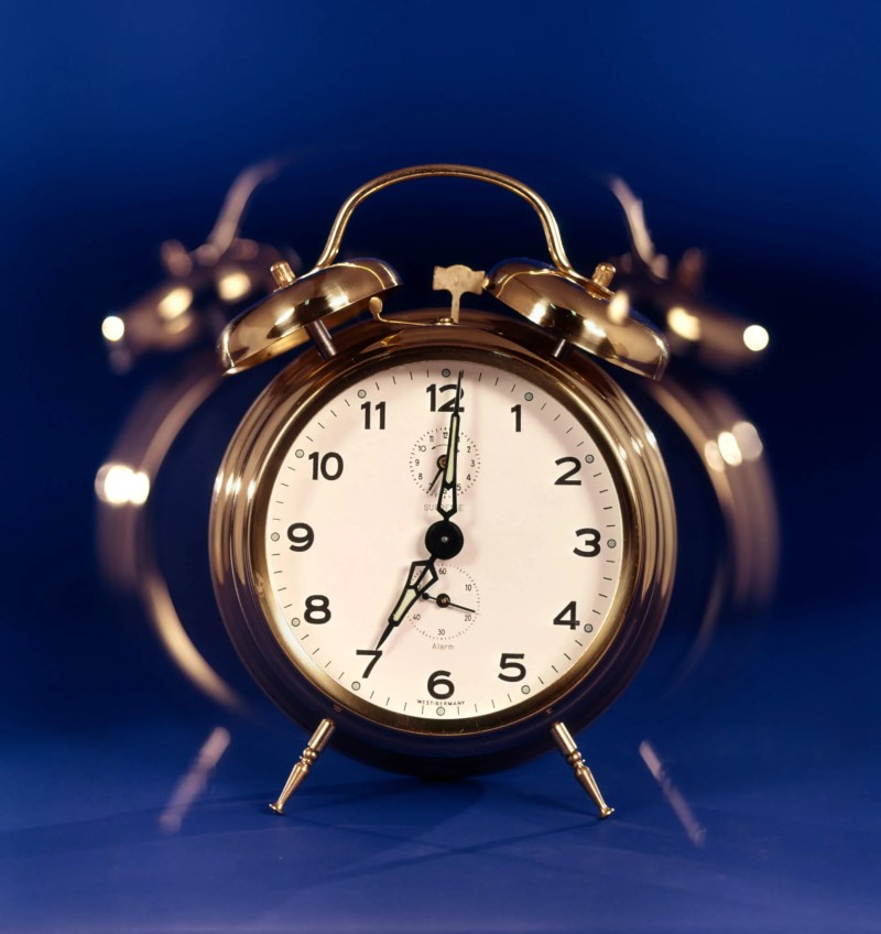 A silver alarm clock illustrates that time is running out for the North Carolina budget to be approved by July 1.