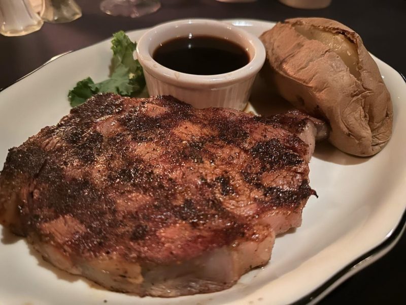 Steak and baked potato at Peddler Steak House in Raleigh NC