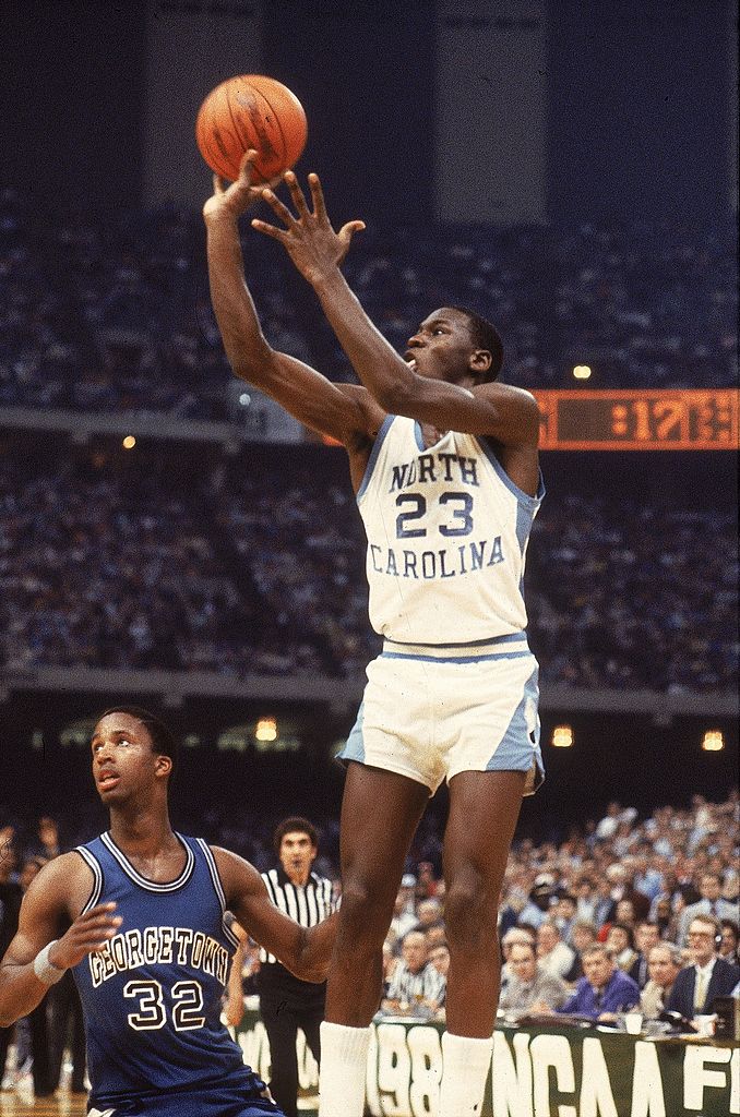 UNITED STATES - MARCH 29: College Basketball: NCAA Final Four, North Carolina Michael Jordan (23) in action, making game winning shot vs Georgetown, New Orleans, LA 3/29/1982 (Photo by Manny Millan/Sports Illustrated via Getty Images) (SetNumber: X26693)