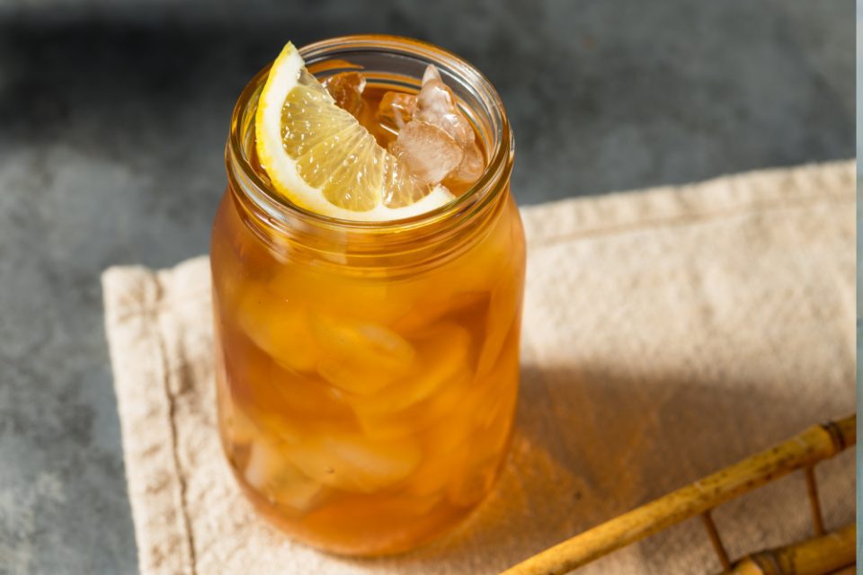 A mason jar of iced tea.