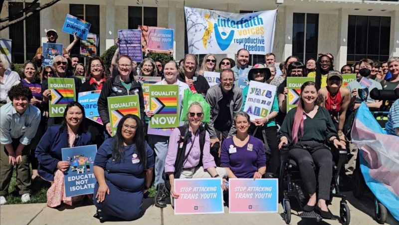 Group photo of LGBTQ+ and repro rights advocates in Raleigh