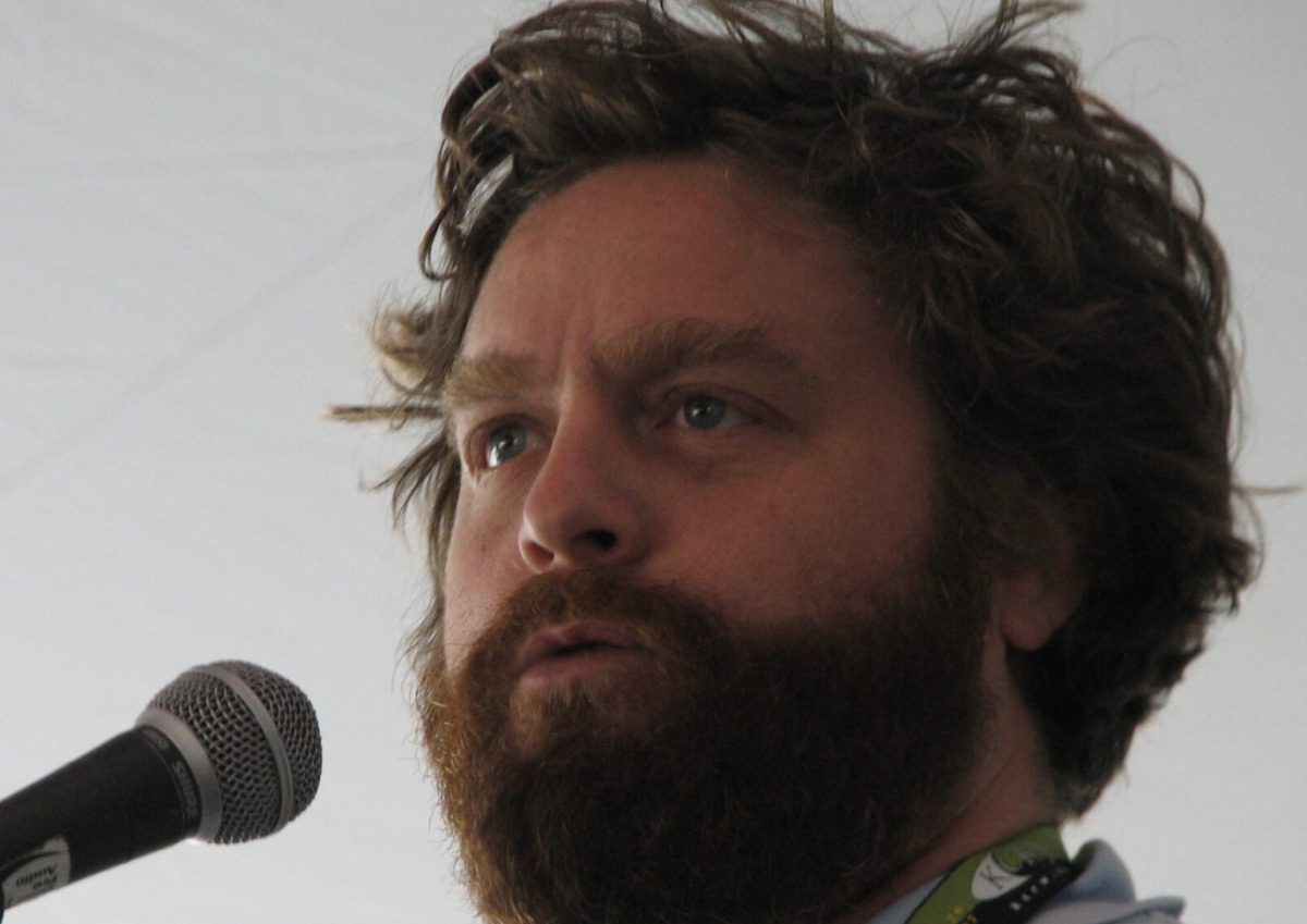 Actor Zach Galifianakis in front of a microphone 